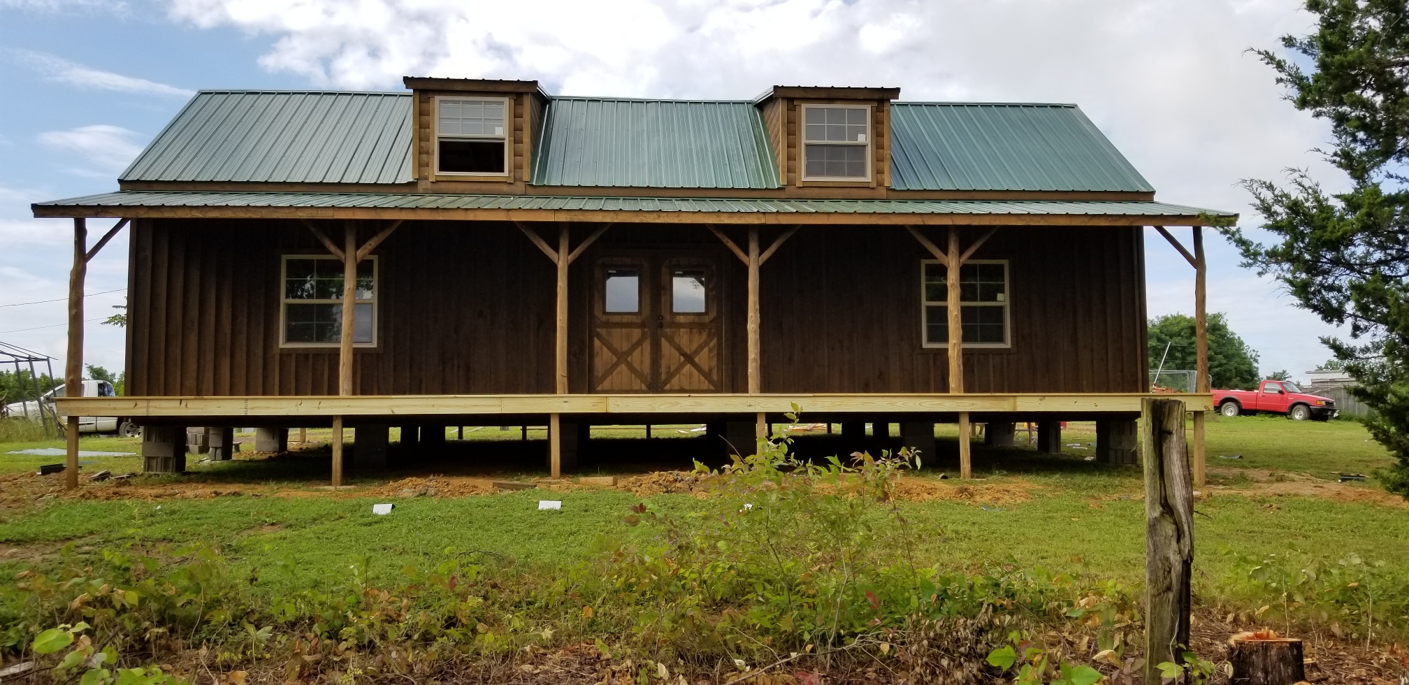 Cabin with green roof